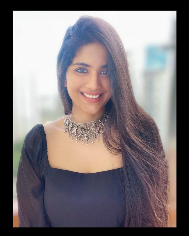 Megha Akash Sizziling Cliks in Black Dress