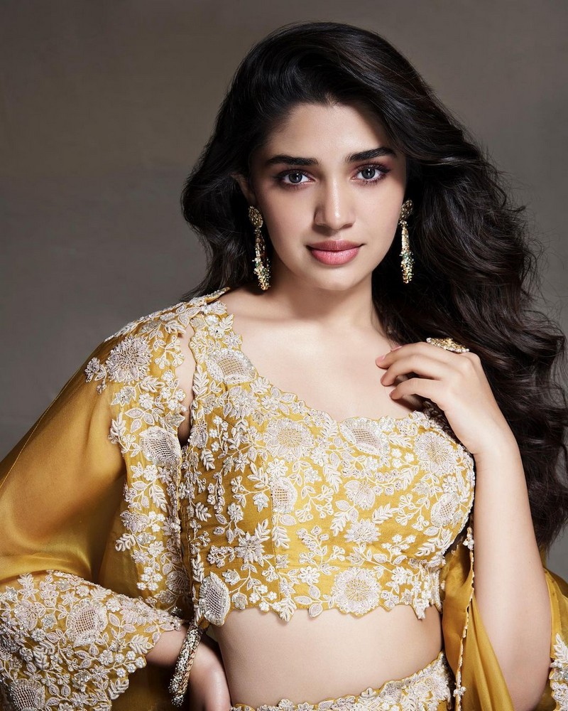 Actress Krithi Shetty Sizzling Clicks in Yellow Outfit