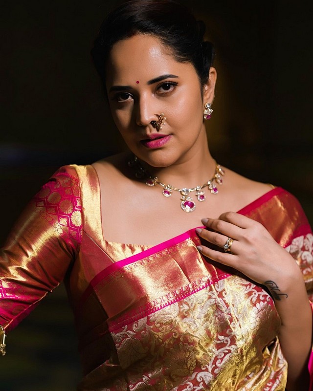 Anasuya Beautiful Clicks in Shiny Silk Saree