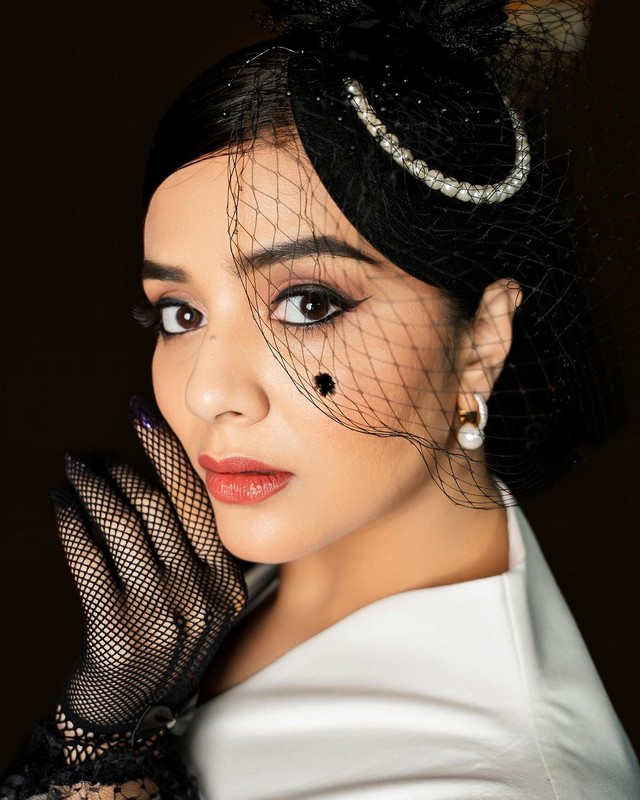 Sreemukhi Looking Pretty in White Dress