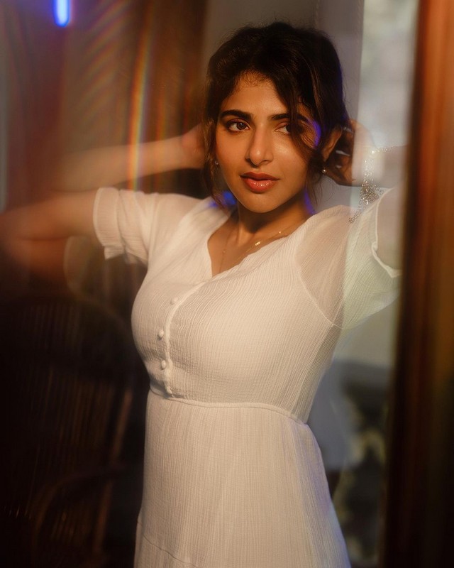 Actress Iswarya menon Sizzling Pics In White Outfit