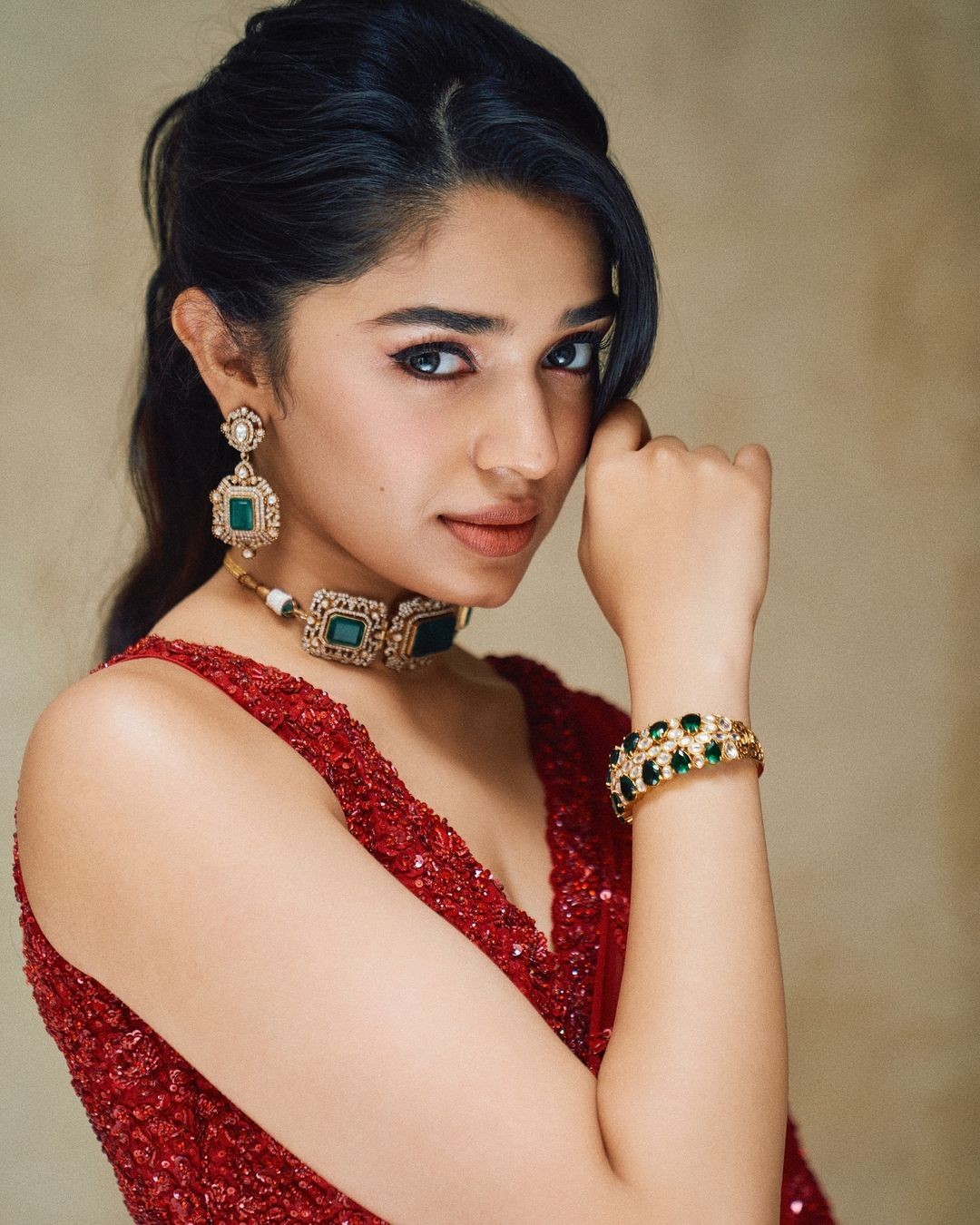 Krithi Shetty Looks Beautiful in Red Saree