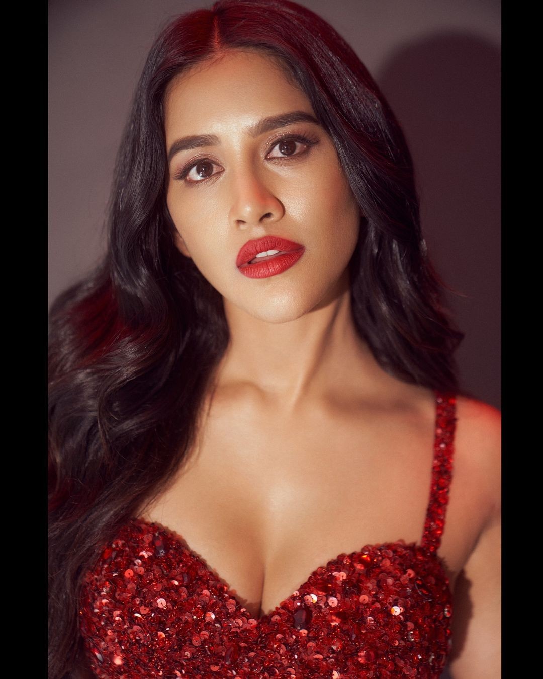 Nabha Natesh Scintillating Looks in Shiny Red Dress